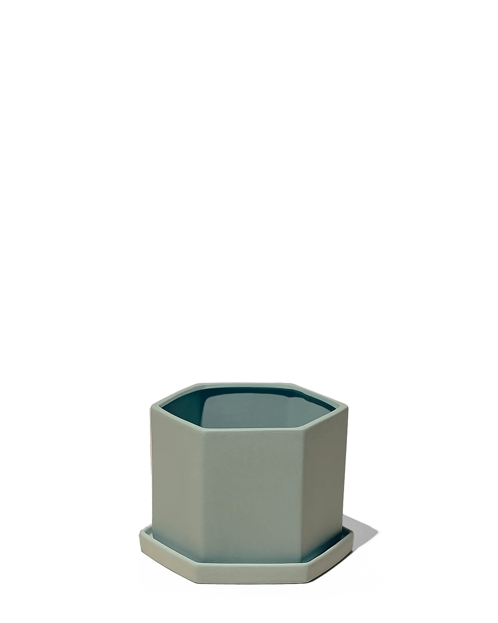 Chive Hexi peacock green matte ceramic medium hexagonal planter with matching saucer.