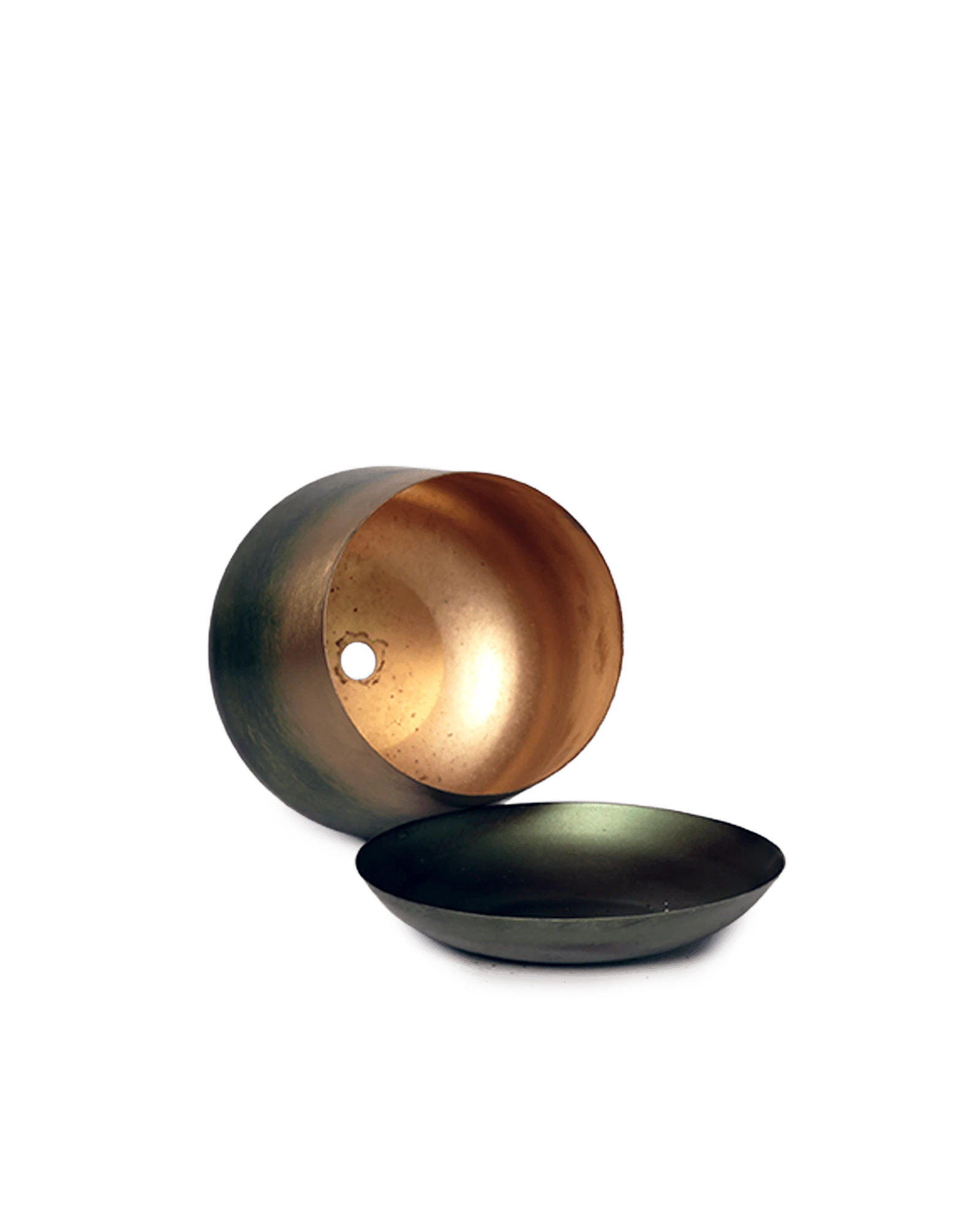 Close up of Chive Joe small forest green gold color metal plant pot drainage hole and detachable saucer.