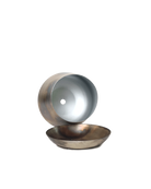 Close up of Chive Joe small silver color metal plant pot drainage hole and detachable saucer.