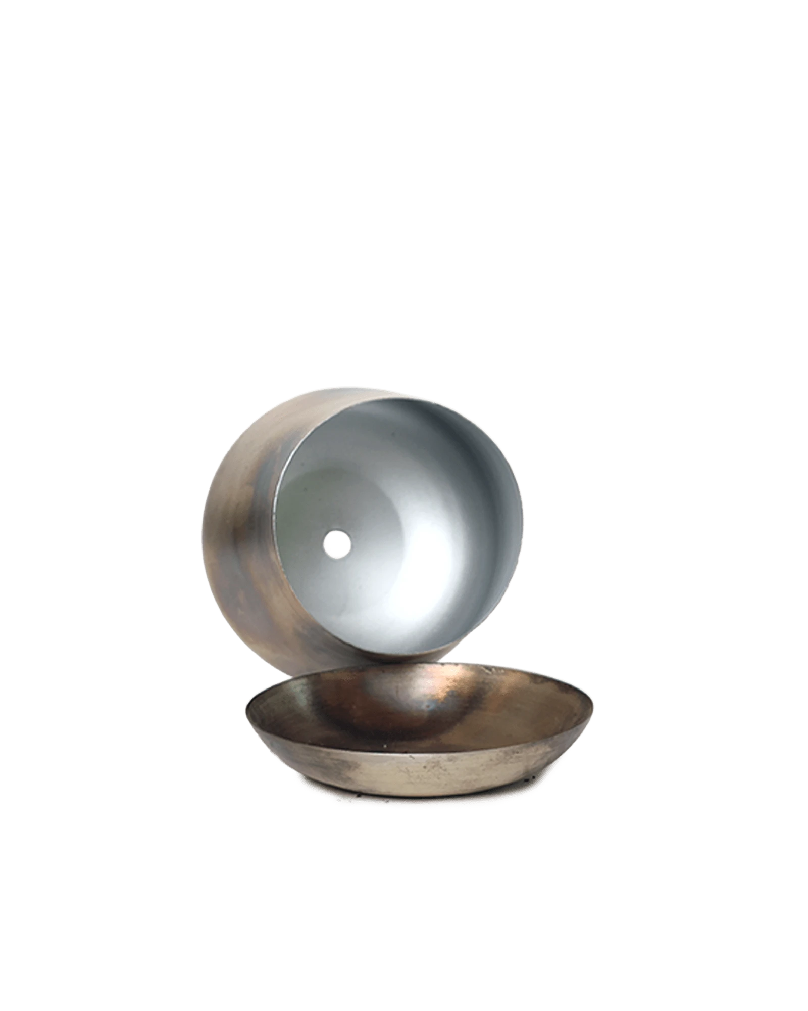 Close up of Chive Joe small silver color metal plant pot drainage hole and detachable saucer.