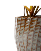 Close-up of the glaze color and textured finish on a Chive Katakana brown ceramic pot.