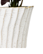 Close-up of the color and vertical ribbed texture finish on a Chive Katakana white ceramic pot.