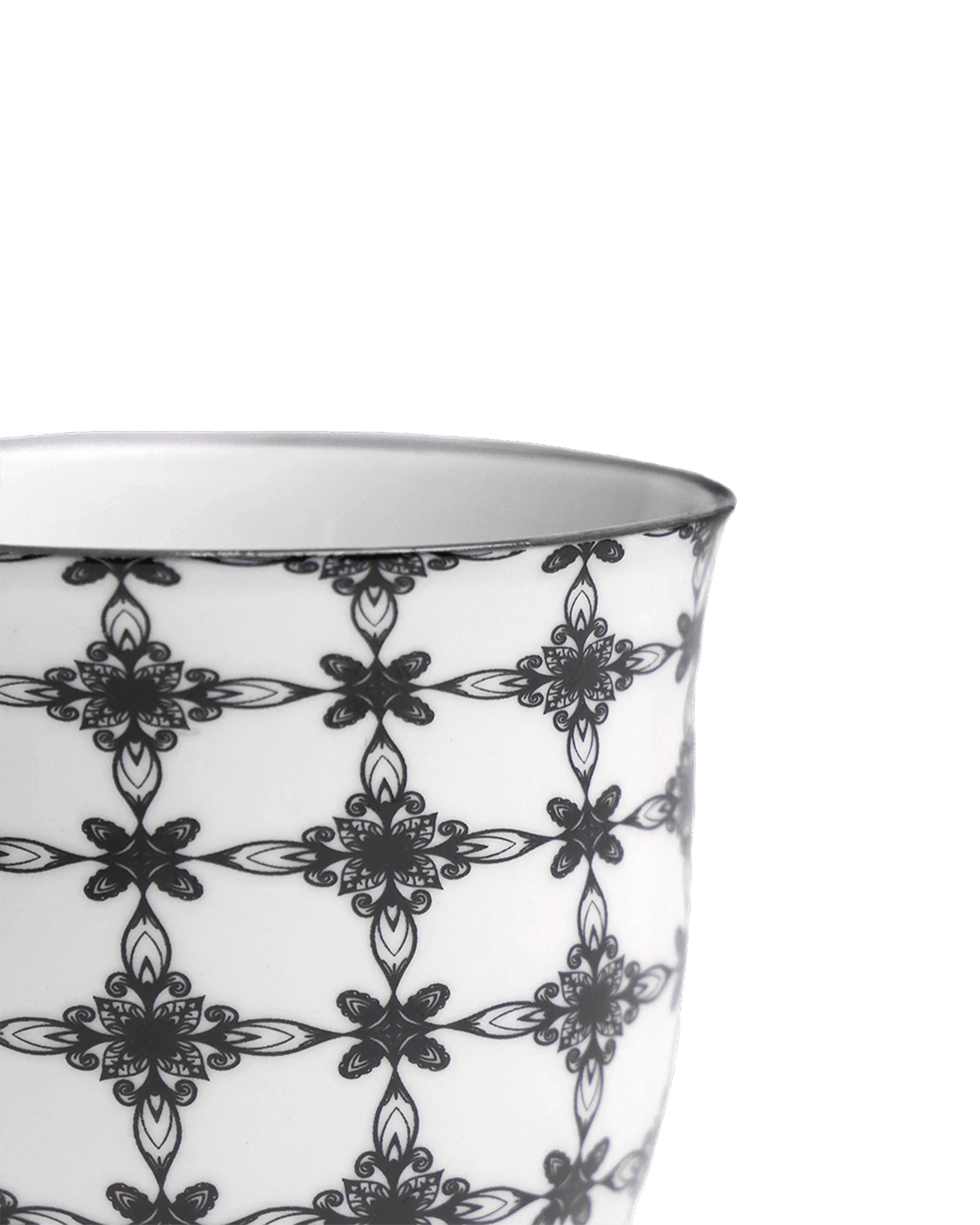 Close-up of the Chive Liberte medium black stars porcelain pot showing the pattern and glaze finish.