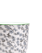 Close-up of the Chive Liberte medium blue flowers porcelain pot showing the pattern and glaze finish.