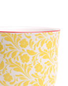 Close-up of the Chive Liberte small yellow flowers porcelain pot showing the pattern and glaze finish.