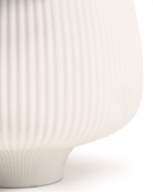 Close-up of the matte and ribbed finish on a Chive Lilo white porcelain large plant pot.