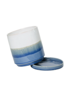 Close-up of the detachable saucer and drainage on a Chive Minute small blue layers ceramic pot.