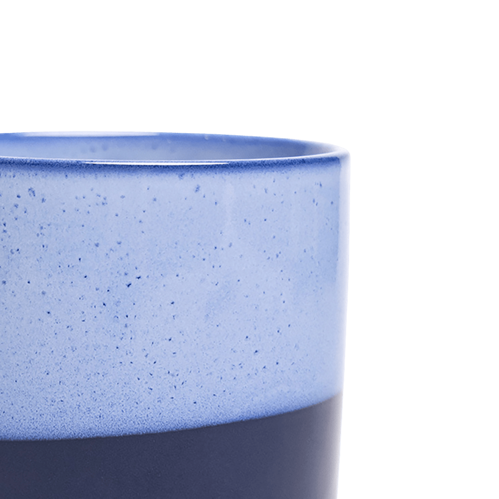 Close-up of the Chive Minute medium cobalt blue ceramic pot showing the color and glaze finish.