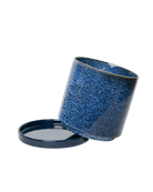Close-up of the detachable saucer and drainage hole on a Chive Minute large cosmos ceramic pot.