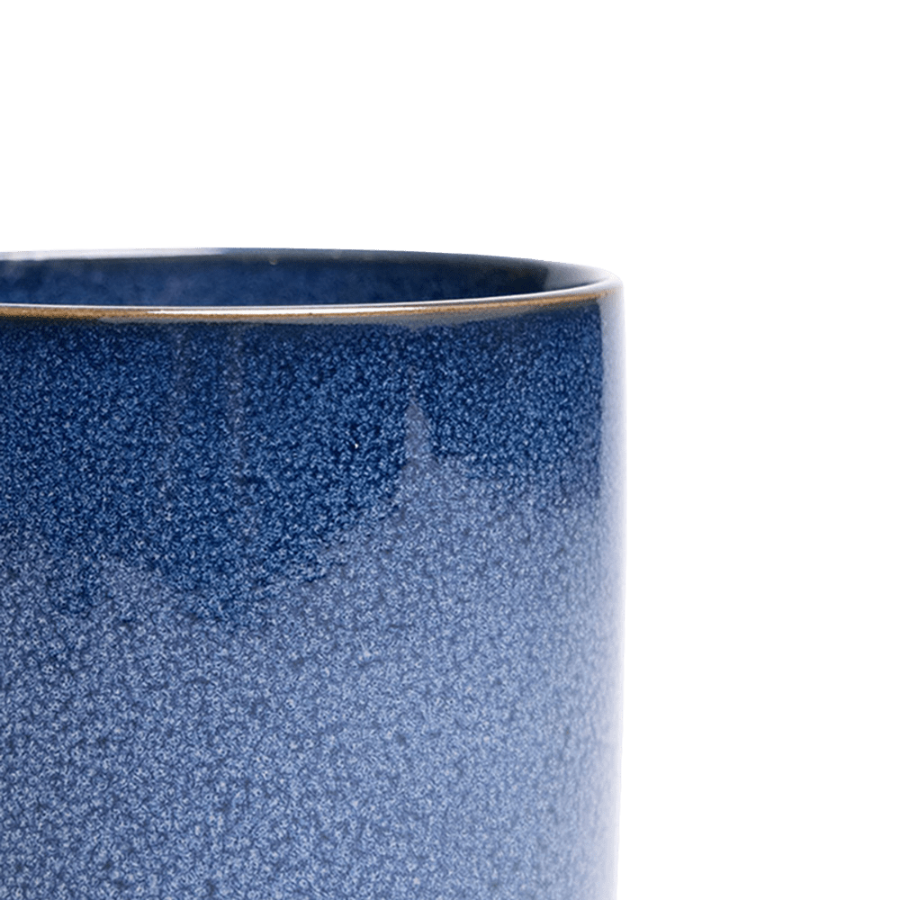 Close-up of the Chive Minute medium cosmos ceramic pot showing the color and glaze finish.