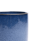 Close-up of the Chive Minute medium cosmos ceramic pot showing the color and glaze finish.