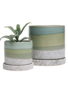 Two Chive Minute green cement ceramic pots with drainage and detachable saucers in size small and medium.