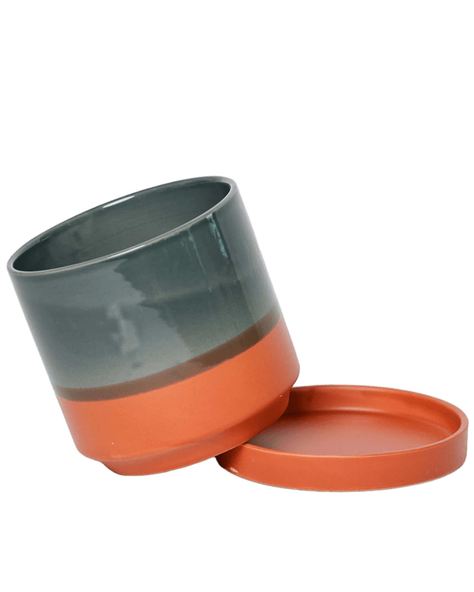Chive Minute small terracotta ceramic pot with drainage tilted to show the detachable saucer.