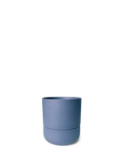 Chive Ryan dark blue ceramic self-watering plant pot with drainage hole and detachable saucer.