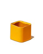 Chive Svek orange color fully glazed ceramic planter with no drainage.