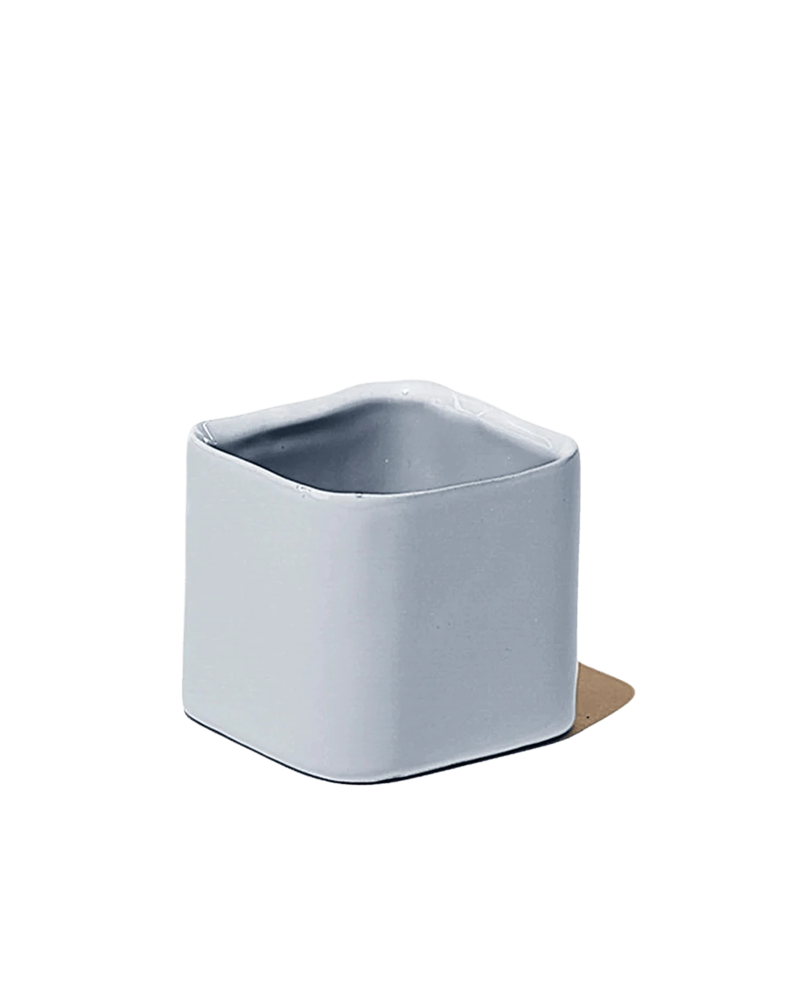 Chive Svek sable color fully glazed ceramic planter with no drainage.