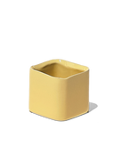Chive Svek yellow color fully glazed ceramic planter with no drainage.