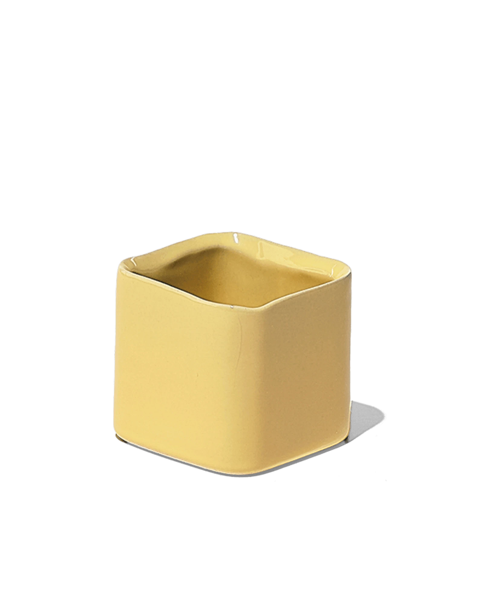 Chive Svek yellow color fully glazed ceramic planter with no drainage.