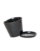 Chive Tika black ceramic large plant pot with drainage tilted to show the detachable saucer.