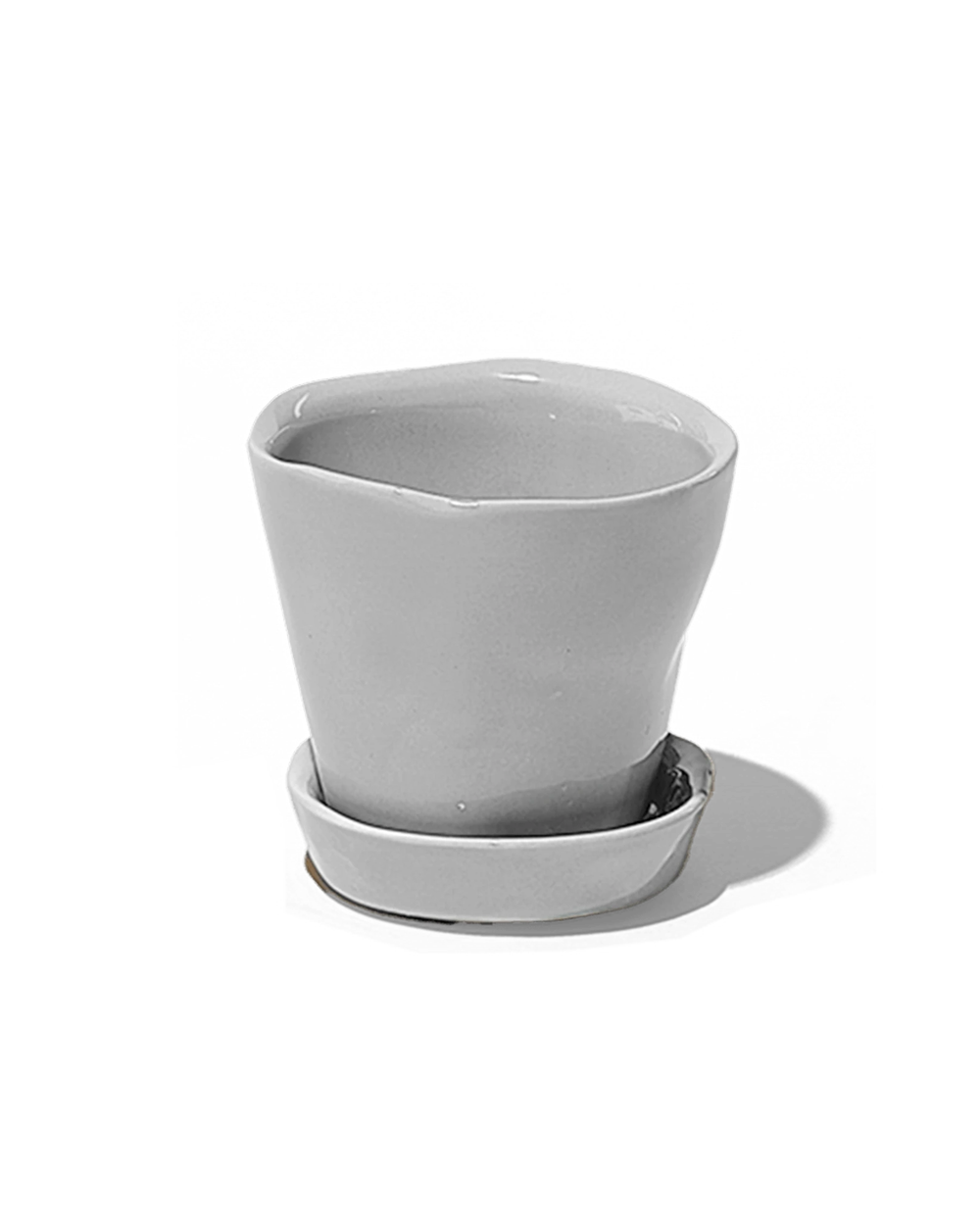 Chive Tika light grey ceramic small plant pot with drainage hole and detachable saucer.