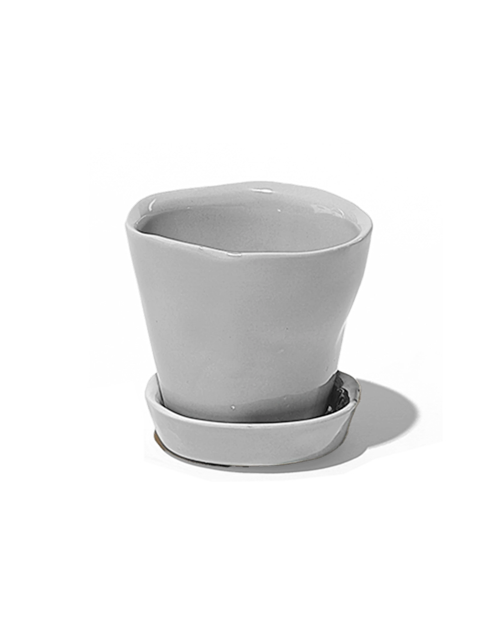Chive Tika light grey ceramic small plant pot with drainage hole and detachable saucer.