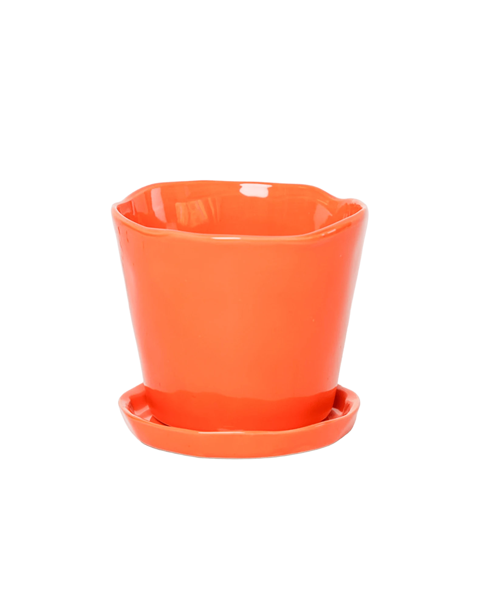 Chive Tika orange ceramic medium plant pot with drainage hole and detachable saucer.