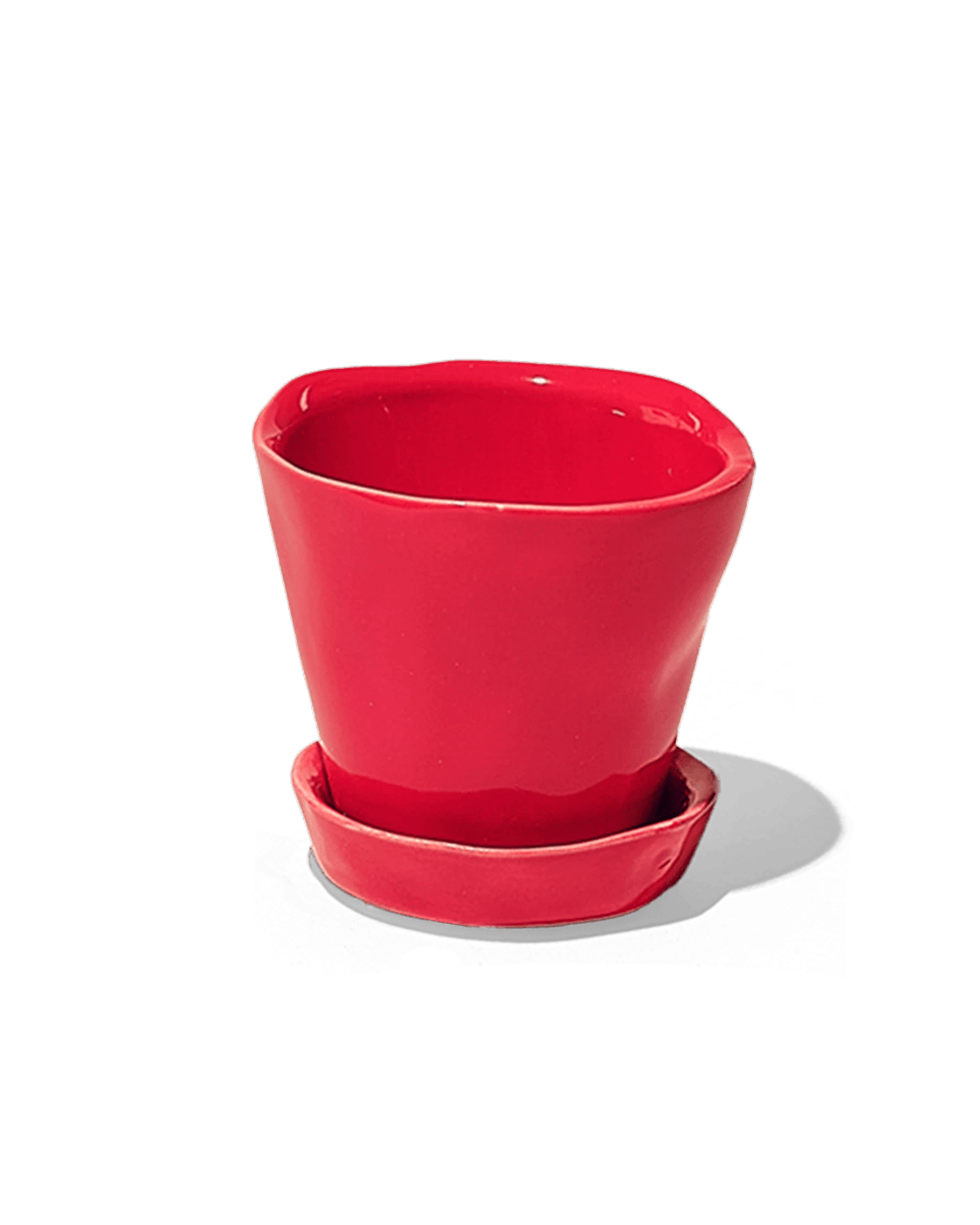 Chive Tika red ceramic small plant pot with drainage hole and detachable saucer.
