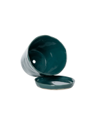 Close-up of the detachable saucer and drainage hole on a Chive Tika spruce ceramic large pot.
