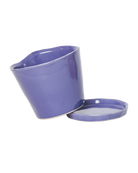 Close-up of the detachable saucer and drainage hole on a Chive Tika ultra violet ceramic medium pot.