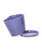 Close-up of the detachable saucer and drainage hole on a Chive Tika ultra violet ceramic medium pot.