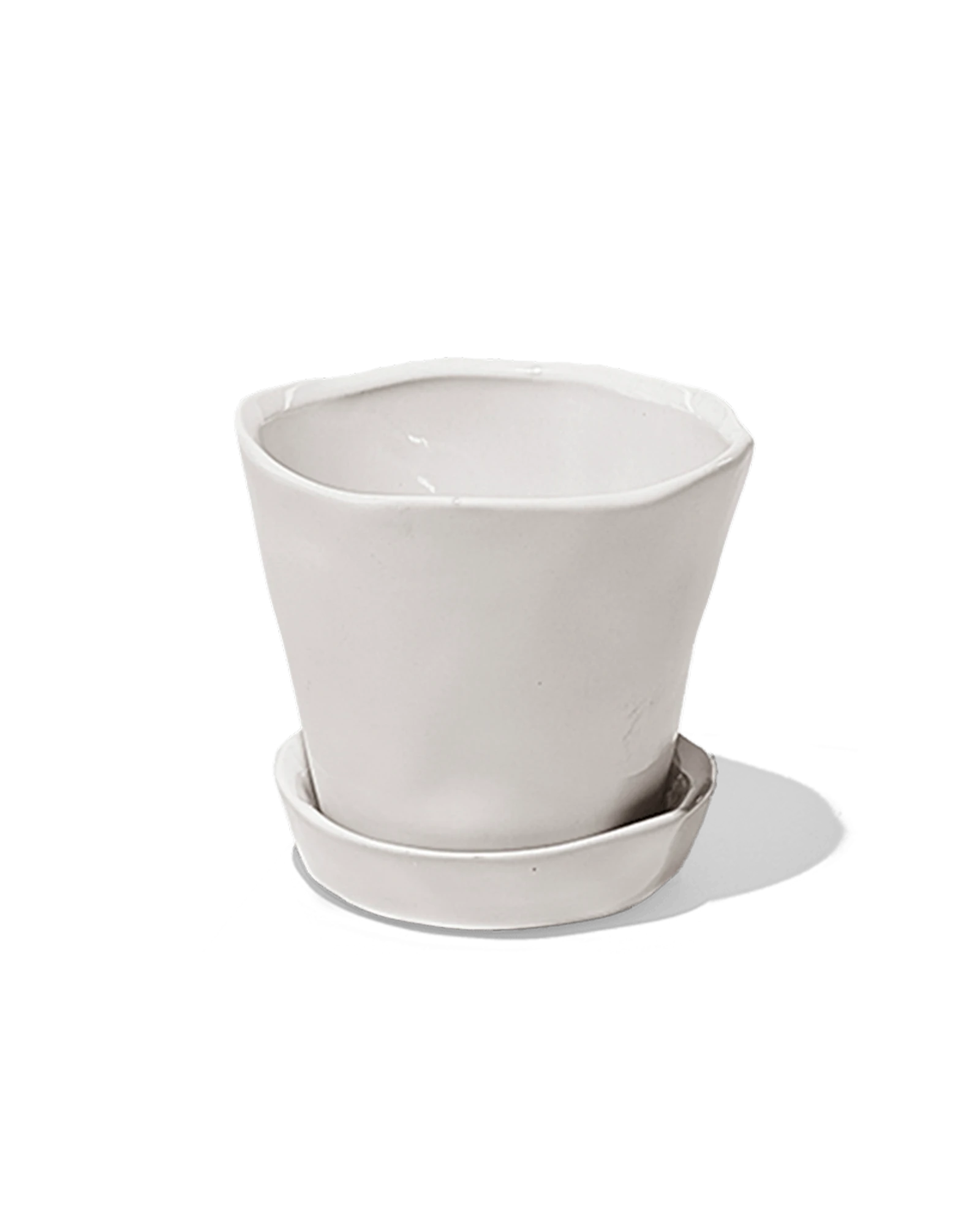 Chive Tika white ceramic small plant pot with drainage hole and detachable saucer.