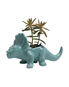 Chive Triceratops Granite Green color glazed ceramic dinosaur shaped planter styled with a small plant.