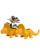 Two Chive Triceratops Lemon Chrome yellow glazed ceramic dinosaur shaped planters styled with a plant.