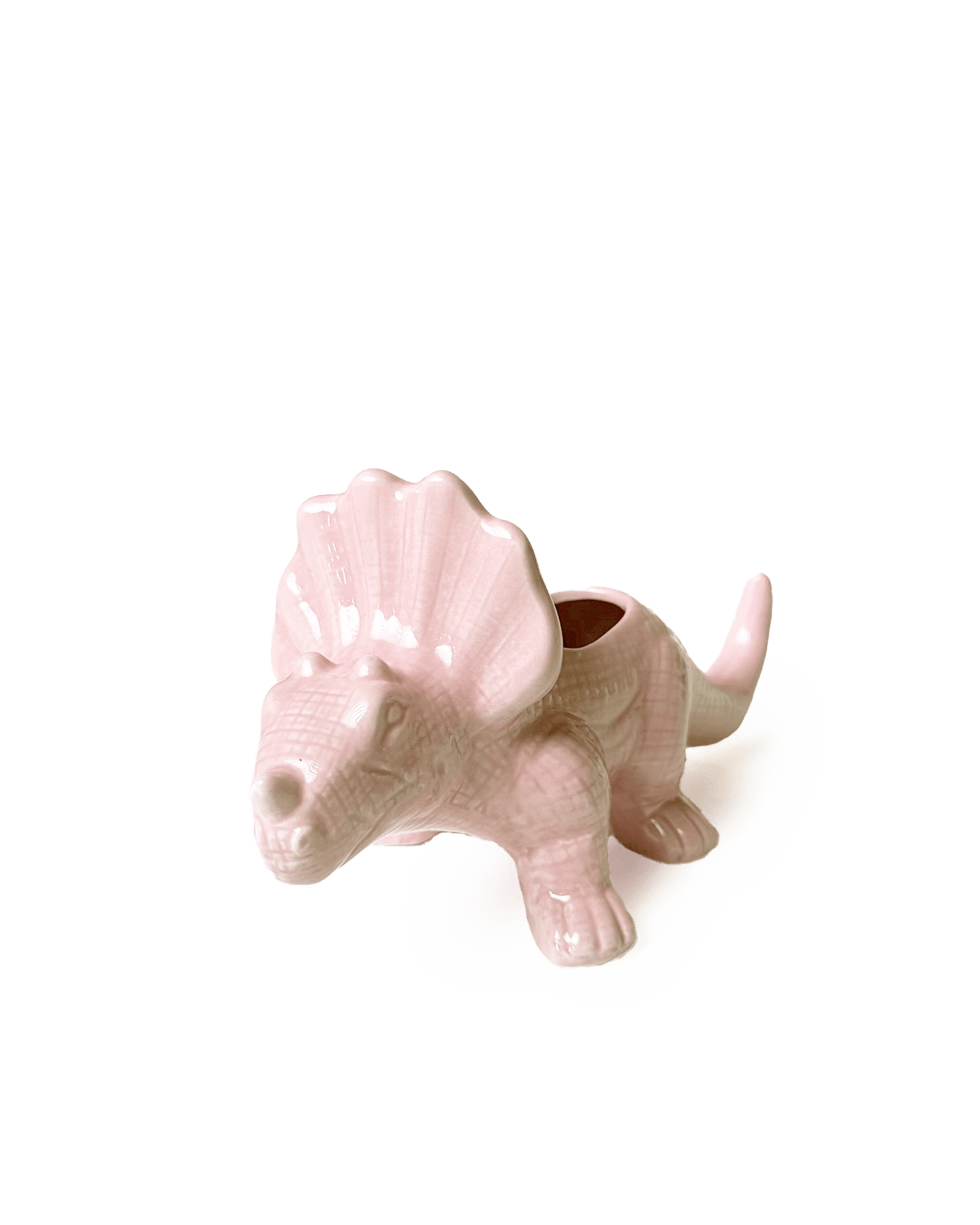 Chive Triceratops pink ceramic dinosaur shaped succulent planter with no drainage.