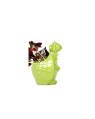 Side view of a Chive Turtle Green color glazed ceramic turtle shaped planter styled with a small plant.