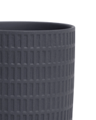 Close-up of the Chive Virago A small black porcelain pot showing the color and textured finish.