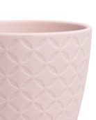Close-up of the Chive Virago B small soft pink porcelain pot showing the color and textured finish.