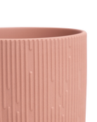 Close-up of the Chive Virago C small clay terracotta porcelain pot showing the color and ribbed texture finish.