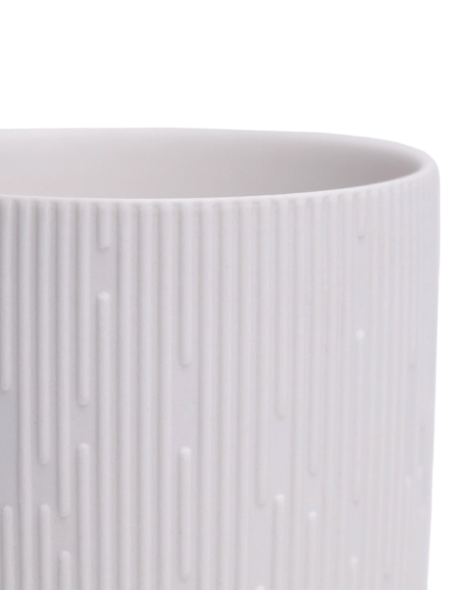 Close-up of the Chive Virago C small white porcelain pot showing the color and ribbed texture finish.