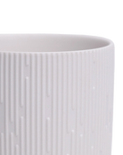 Close-up of the Chive Virago C small white porcelain pot showing the color and ribbed texture finish.