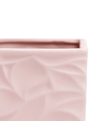 Close-up of the Chive Virago D small soft pink porcelain pot showing the color and geometric texture.