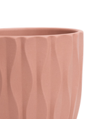 Close-up of the Chive Virago E small clay terracotta porcelain pot showing the color and vertical wave texture.