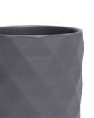 Close-up of the Chive Virago F small black porcelain pot showing the color and diamond-shaped textured finish.