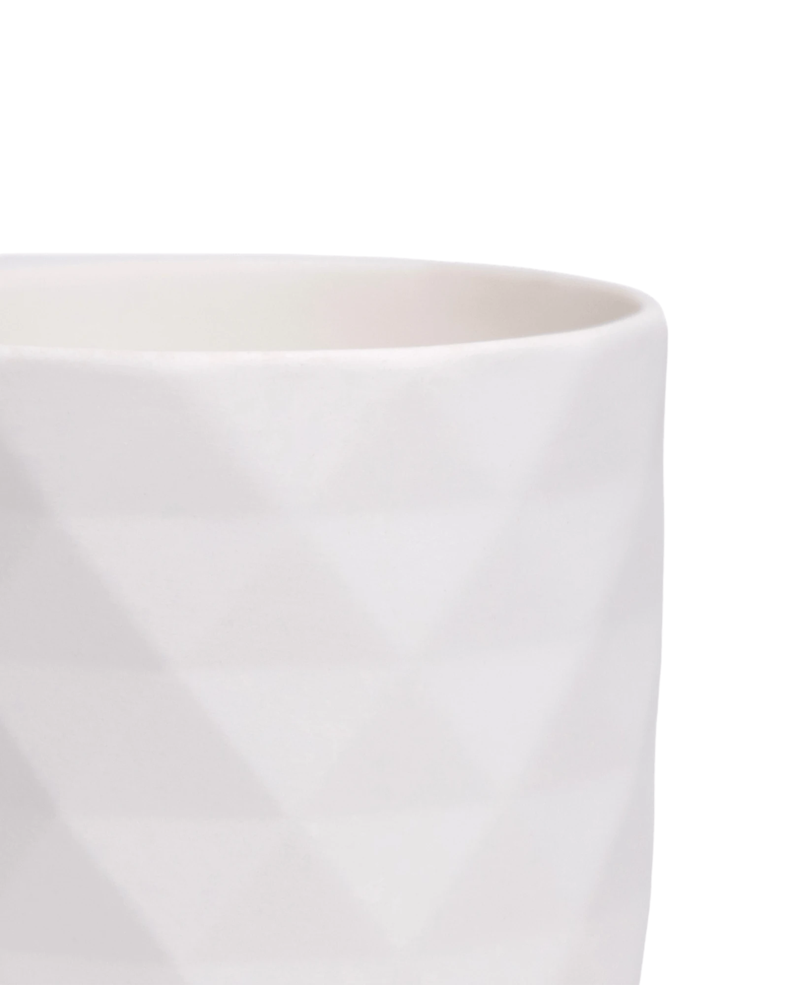 Close-up of the Chive Virago F small white porcelain pot showing the color and diamond-shaped texture.