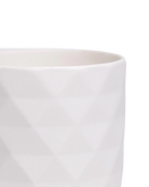 Close-up of the Chive Virago F small white porcelain pot showing the color and diamond-shaped texture.