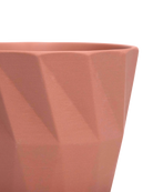 Close-up of the Chive Virago G medium clay terracotta porcelain pot showing the color and geometric texture.