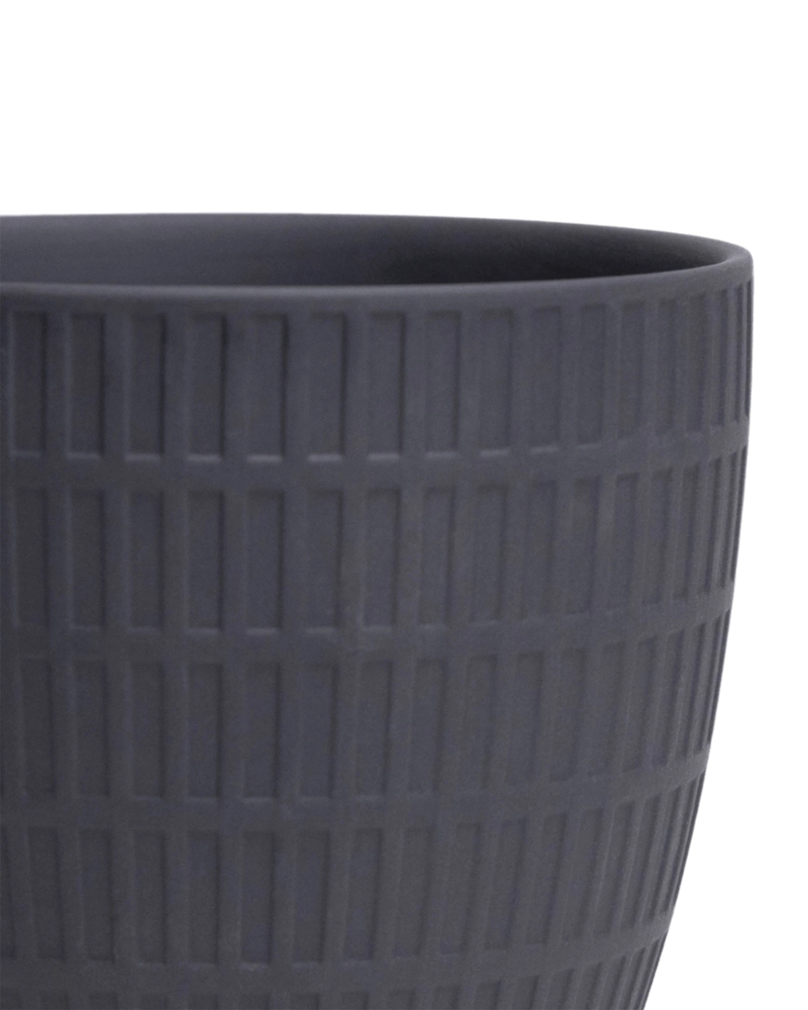Close-up of the Chive Virago I large black porcelain pot showing the textured finish.