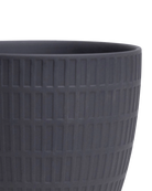 Close-up of the Chive Virago I large black porcelain pot showing the textured finish.