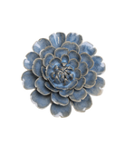 A ceramic succulent flower dish with layered petals in a textured blue and gray glaze, photographed on a solid white background.