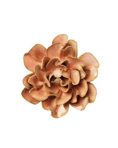 A single artificial flower bloom with layered ruffled petals in warm peach, tan, and light brown tones, isolated on a plain white background.